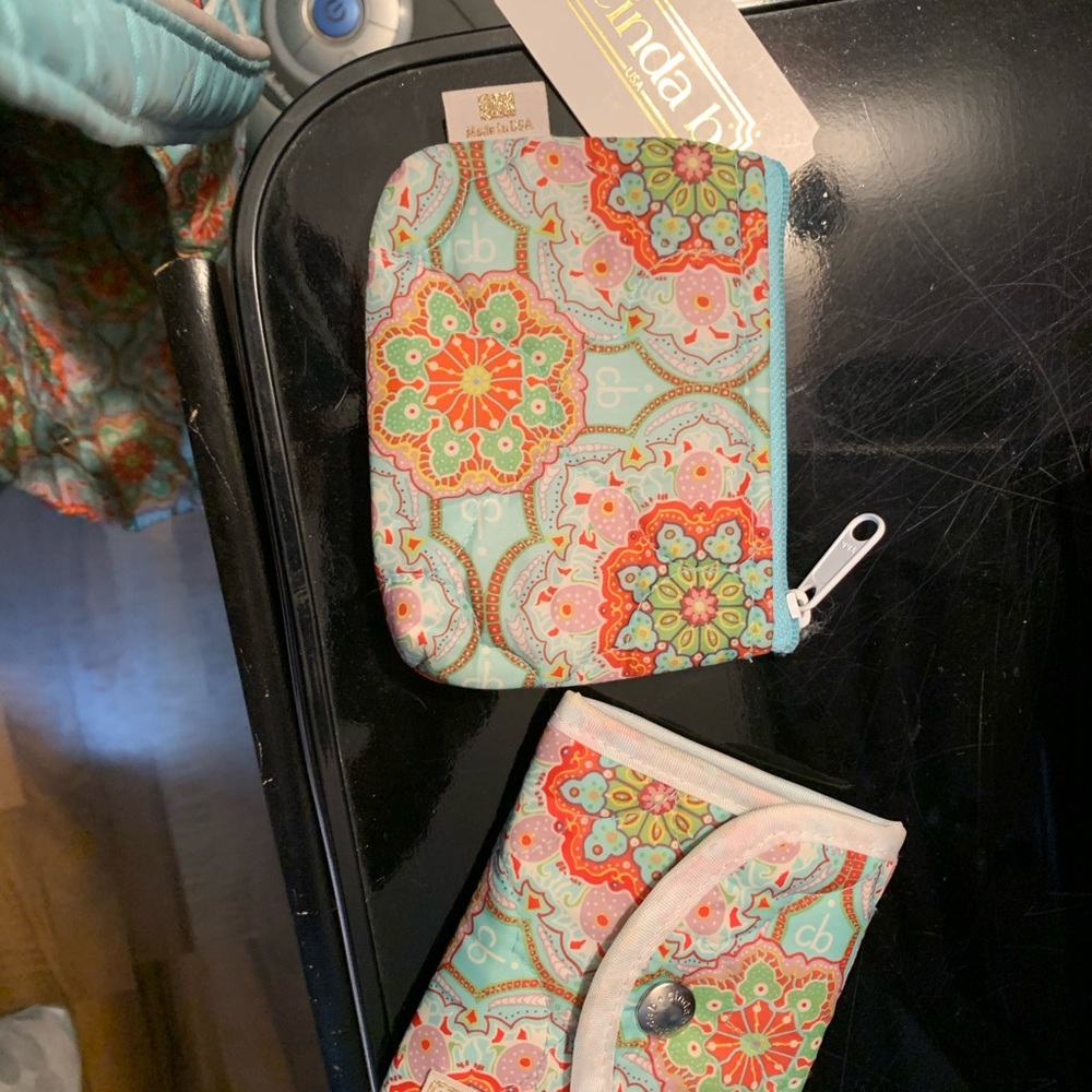 Light Blue tote with change purse and wallet.
